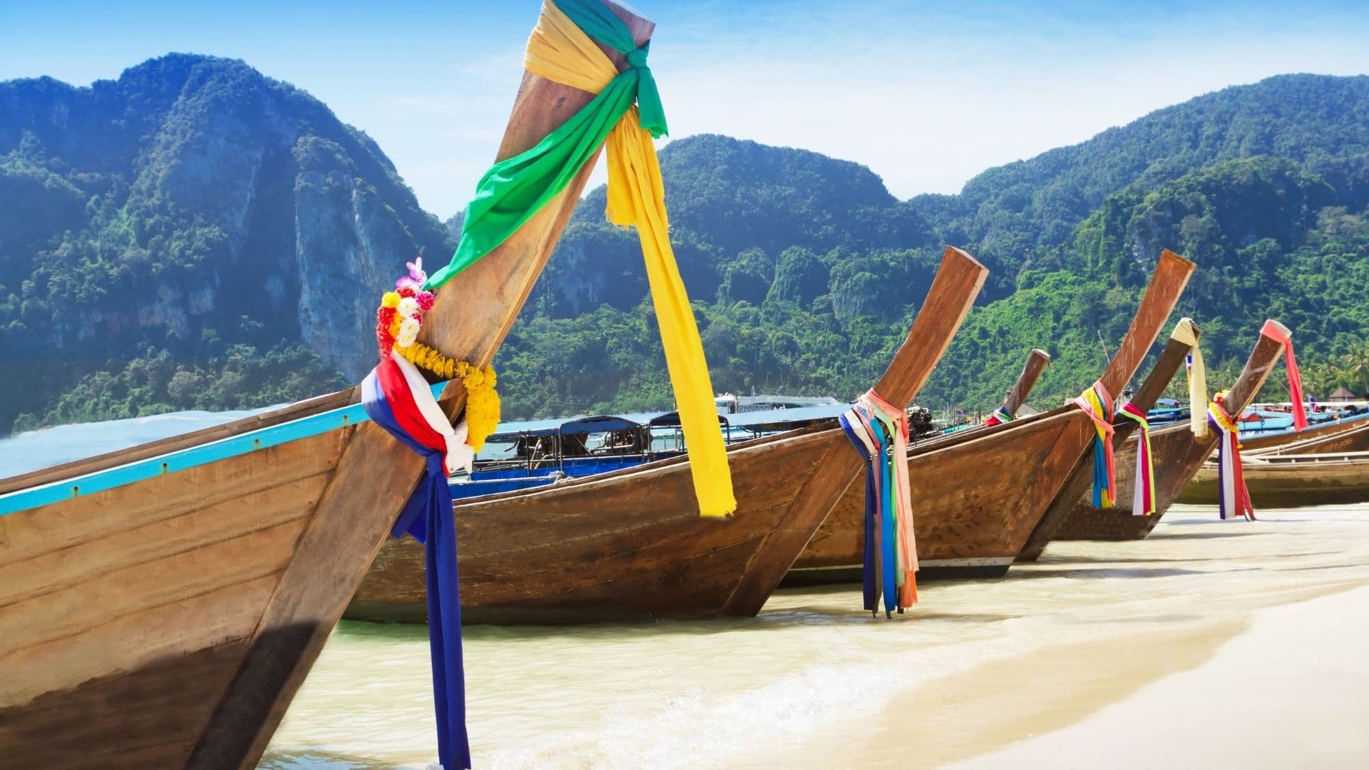 Longtail boats with ribbons on the beach, Koh Phi Phi