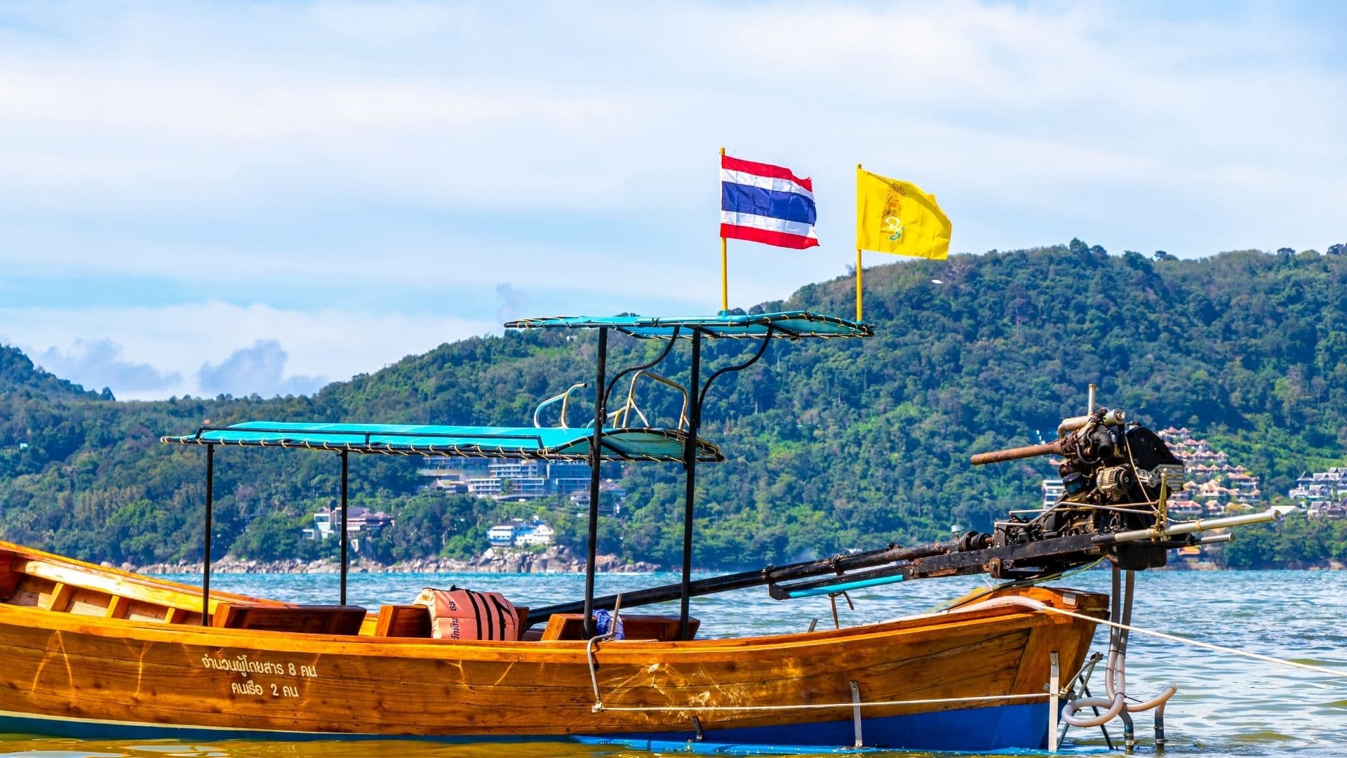 Longtail boats on a tropical Thai beach